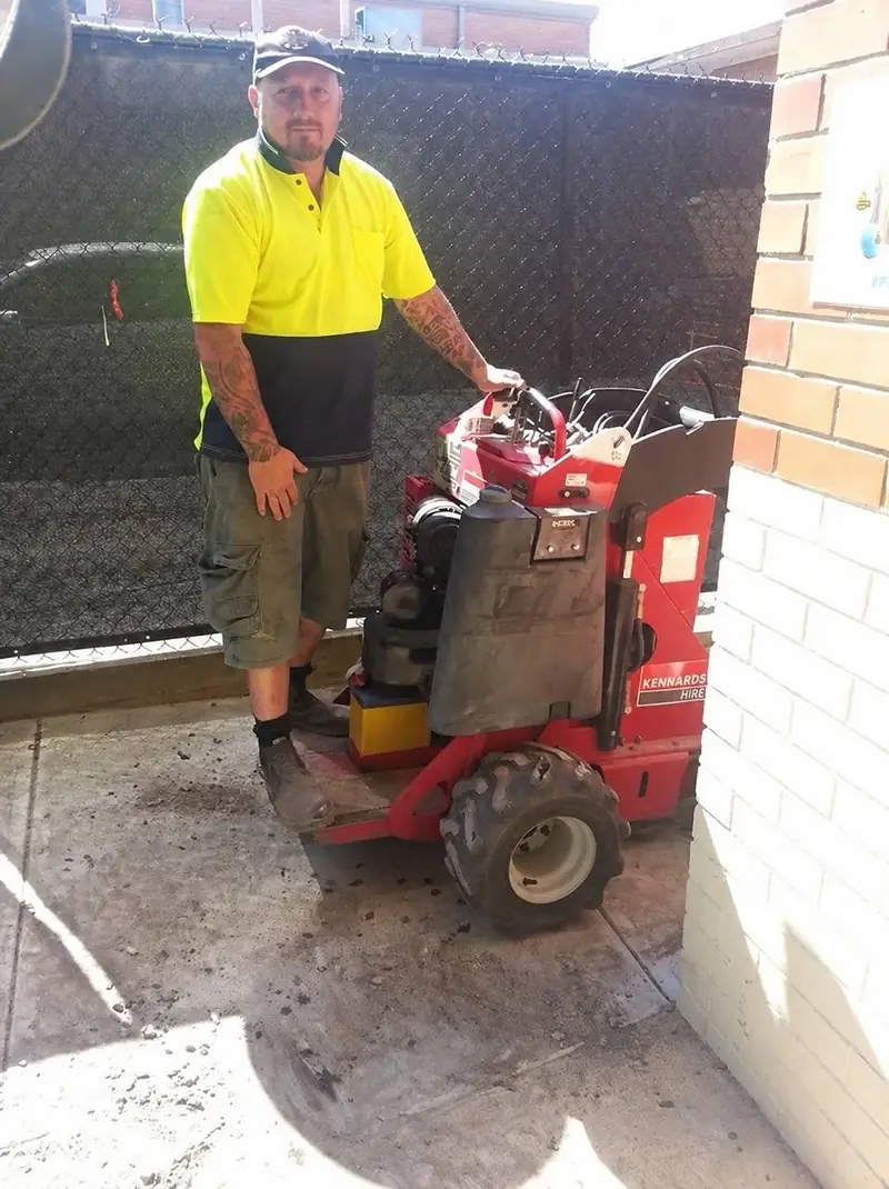 Jason, the owner and lead installer of Premium Turf Melbourne, on site with his installation equipment